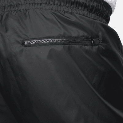 Pantalon doublé en tissu tissé Nike Windrunner pour homme