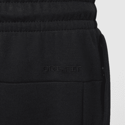 Pants Dri-FIT entallados versátiles con protección UV para hombre Nike Primary