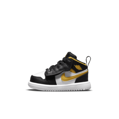 black and yellow infant jordans