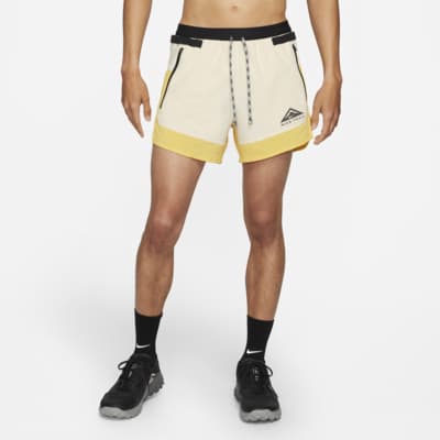 nike trail shorts yellow