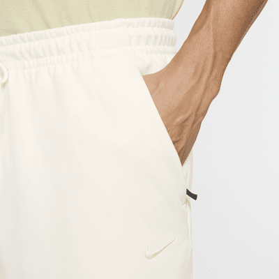 Pants Dri-FIT entallados versátiles con protección UV para hombre Nike Primary