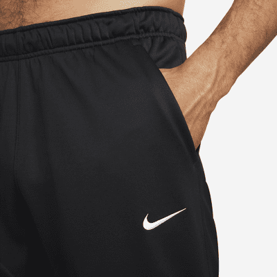 Pants de fitness con dobladillo abierto Therma-FIT para hombre Nike Therma