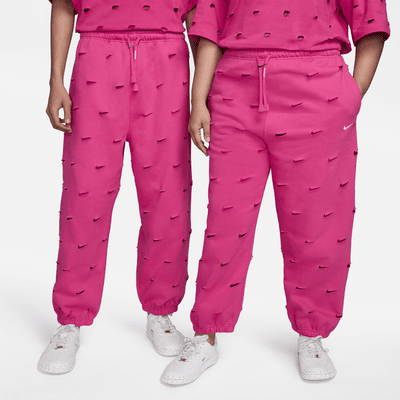 Pink nike 2025 track pants