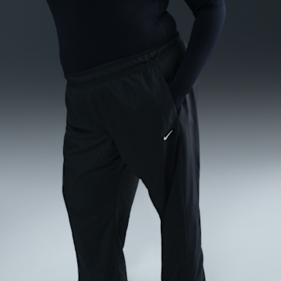Pantalones de tiro medio con dobladillo abierto para mujer Nike Sportswear Classic (talla grande)