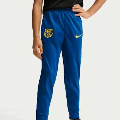 FC Barcelona Strike Fourth Nike Dri-FIT Fußball-Tracksuit aus Strickmaterial für jüngere Kinder