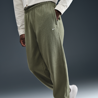 Pants de tejido Fleece con puños para hombre Nike Solo Swoosh