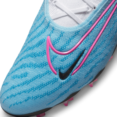 Tacos de fútbol de corte low para terreno firme Nike Phantom GX Elite