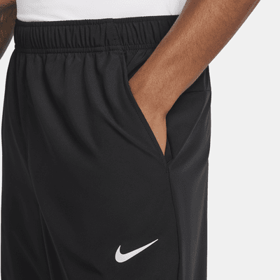 Pants Dri-FIT versátiles con dobladillo abierto para hombre Nike Form