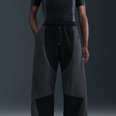 Vævede Nike Tech Boreas-bukser med åben kant til mænd