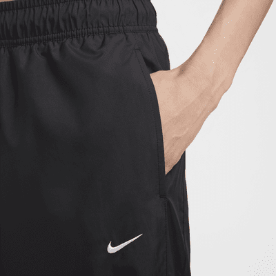 Joggers de tiro medio holgados con protección contra los rayos UV para mujer Nike Sportswear Classic Wovens