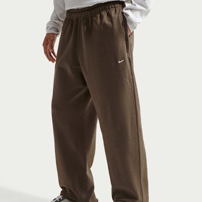 Pants de tejido Fleece con dobladillo abierto para hombre Nike Solo Swoosh