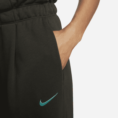 Pants con dobladillo abierto de tejido Fleece de cintura alta para mujer Nike Sportswear Everyday Modern