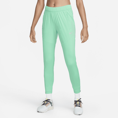 Circular trabajo licencia Nike Dri-FIT Essential Pantalón de running - Mujer. Nike ES