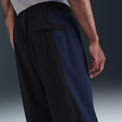 Pants de tejido Woven Dri-FIT de colores contrastantes de ajuste holgado para hombre Nike Tech