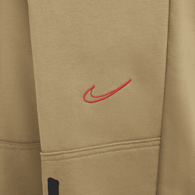 Damskie spodnie z dzianiny dresowej o kroju oversize ze średnim stanem Nike Sportswear Breaking