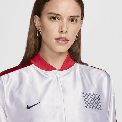 Playera de básquetbol Nike de temporada para mujer USA Village