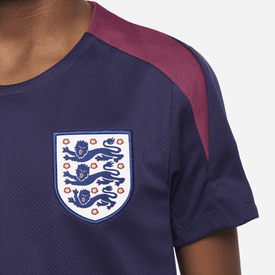 Anglaterra Strike Part superior de futbol de màniga curta i teixit Knit Nike Dri-FIT - Nen/a