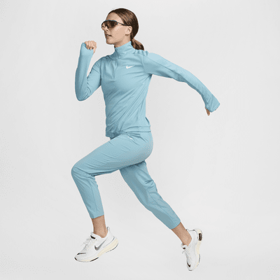 Pantaloni da running a 7/8 a vita media Nike Dri-FIT Fast – Donna