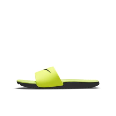 yellow nike flip flops