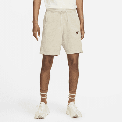 beige nike shorts