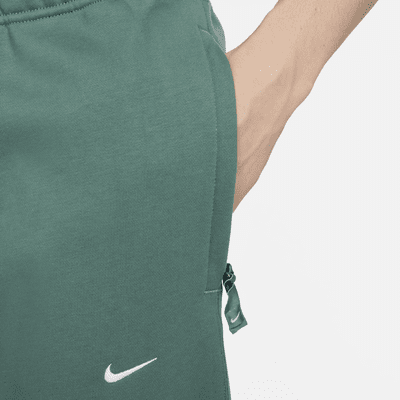 Pants de tejido Fleece con dobladillo abierto para hombre Nike Solo Swoosh