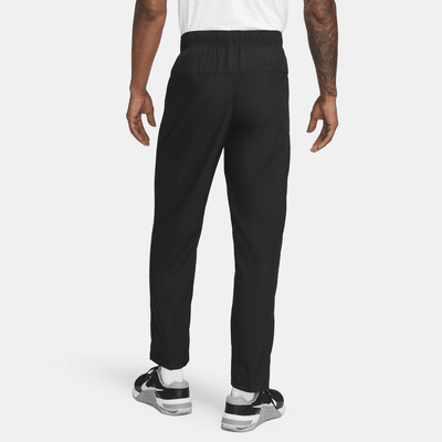 Pants Dri-FIT versátiles con dobladillo abierto para hombre Nike Form