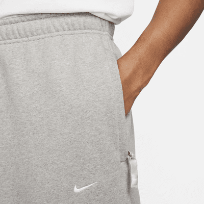 Pants de tejido Fleece con dobladillo abierto para hombre Nike Solo Swoosh