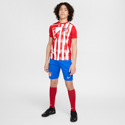 Atlético Madrid Academy Pro Home Older Kids' Nike Dri-FIT Football Pre-Match Short-Sleeve Top