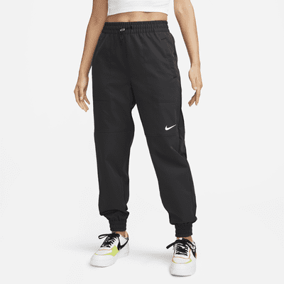 candidato salto Ensangrentado Nike Sportswear Swoosh Pantalón de tejido Woven - Mujer. Nike ES