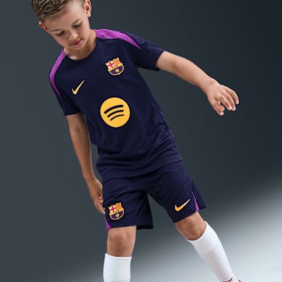 Maglia da calcio a manica corta Nike Dri-FIT FC Barcelona Strike – Ragazzo/a