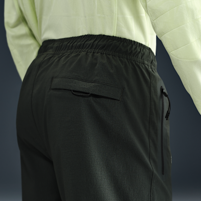 Chelsea F.C. Tech Men's Nike Football Woven Pants