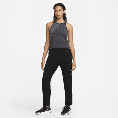Camiseta de tirantes de entrenamiento de ajuste slim para mujer Nike ...
