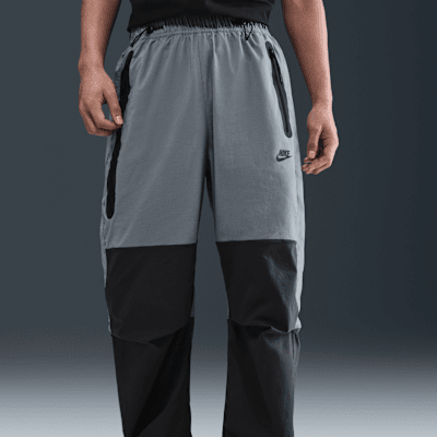 กางเกงขายาวทรงเปิดชายแบบทอผู้ชาย Nike Tech