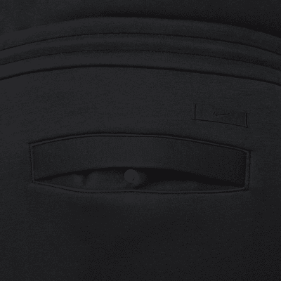 Nike Sportswear Tech Fleece Reimagined-sweatpants med løs pasform og åben kant til mænd