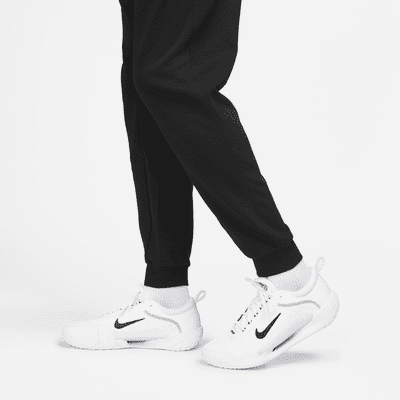 NikeCourt Heritage Men's French Terry Tennis Trousers