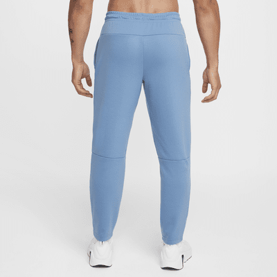 Pants Dri-FIT entallados versátiles con protección UV para hombre Nike Primary