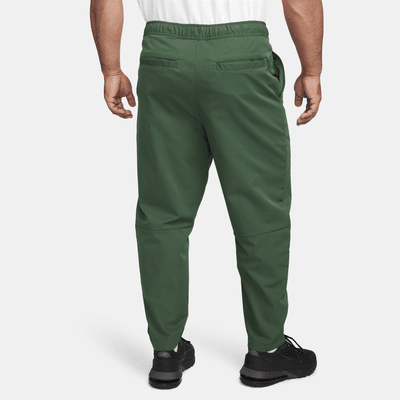 Pants entallados de tejido Woven para hombre Nike Club