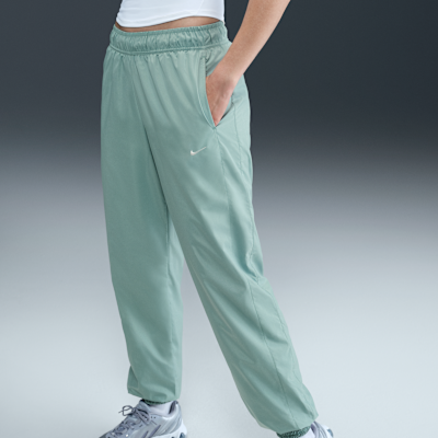 Joggers de tiro medio holgados con protección contra los rayos UV para mujer Nike Sportswear Classic Wovens