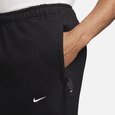 Pants de tejido Fleece con dobladillo abierto para hombre Nike Solo Swoosh