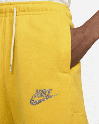 yellow nike fleece shorts