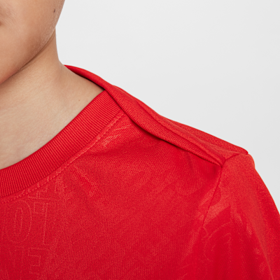 Playera de fútbol de manga corta Nike Dri-FIT para antes del partido para niños talla grande USMNT Academy Pro