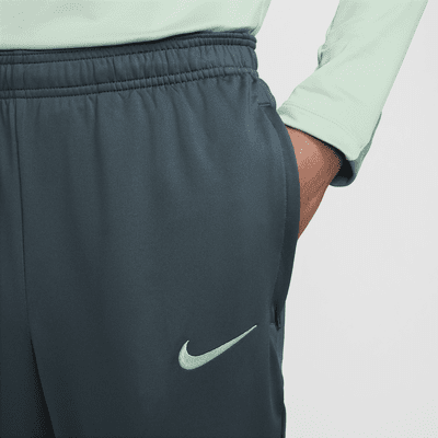 Męskie spodnie piłkarskie Nike Dri-FIT Tottenham Hotspur Strike (wersja trzecia)