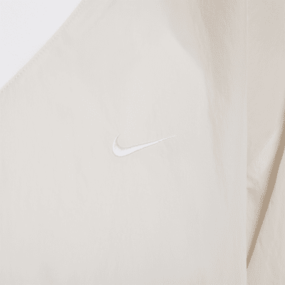 Nike Sportswear Essential ruime, geweven damestop met uv-bescherming lange mouwen en V-hals