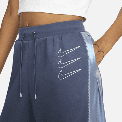 Pantalones de entrenamiento de tejido Fleece con gráficos para mujer Nike Sportswear