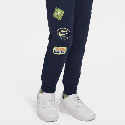 Pantalones de entrenamiento de tejido Fleece para niños talla pequeña Nike Sportswear
