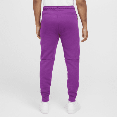 Nike Tech Jogger de tejido Fleece con detalles de diseño reflectante - Hombre