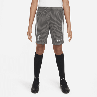 Liverpool F.C. Strike Older Kids' Nike Dri-FIT Football Shorts. Nike IE