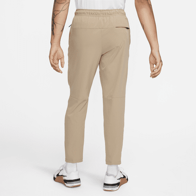 Pants versátiles Dri-FIT de pierna entallada para hombre Nike Unlimited