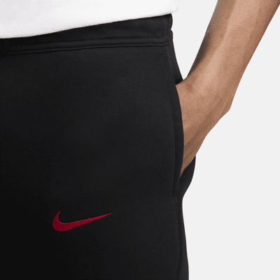 Pánské fotbalové běžecké kalhoty Nike Liverpool FC Tech Pack Fleece