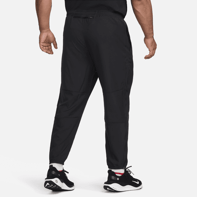 Pantaloni da running in tessuto Dri-FIT Nike Challenger – Uomo